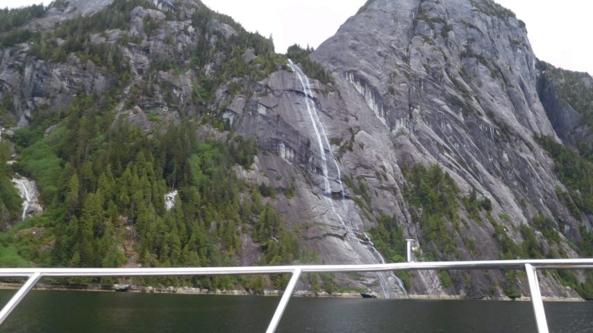 Waterfall dropping over a vertical granite face