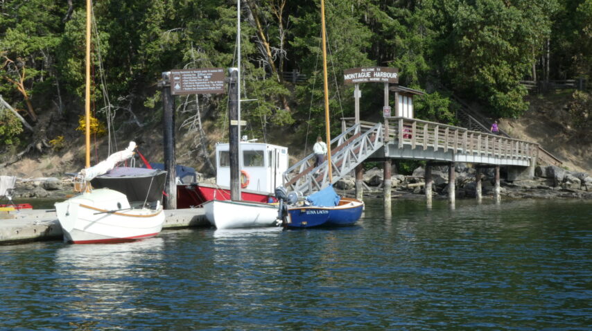 Small boats at the Montague Harbour Provincial Park Wharf