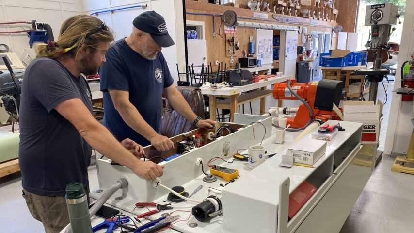 Photo of school working on the "pump-out sled"