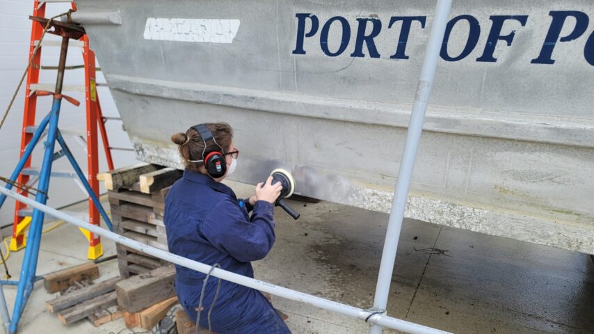 Female student working on Port of Port Townsend Work Boat