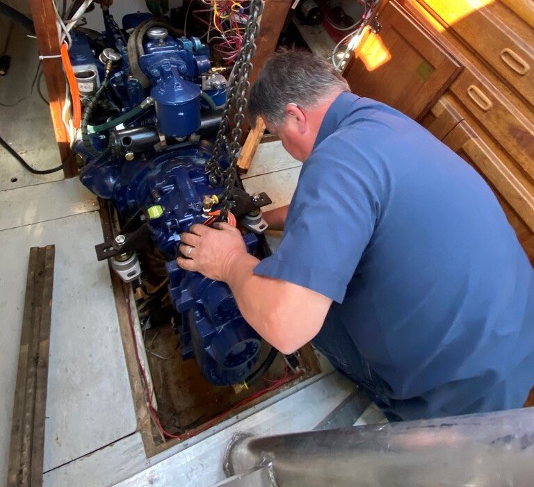 Engine being installed on sailboat Hadley