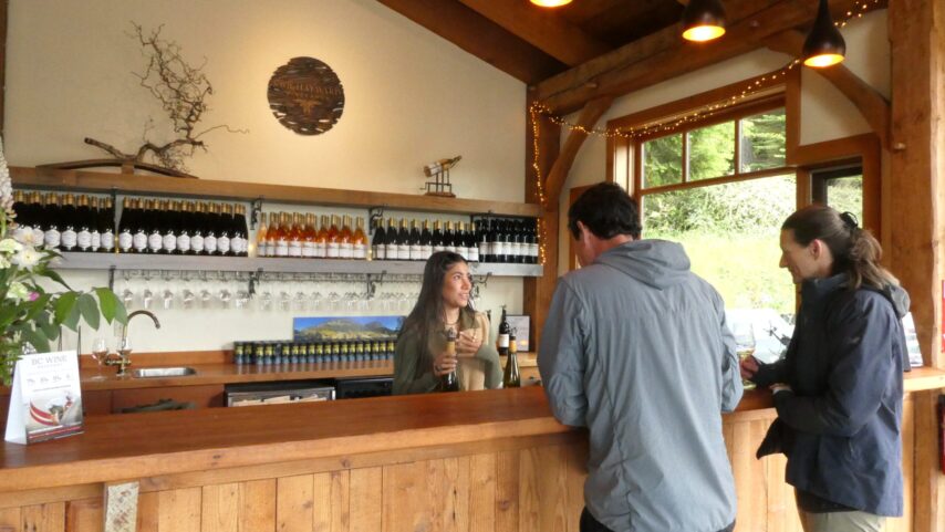 Photo of couple at the wine-tasting bar