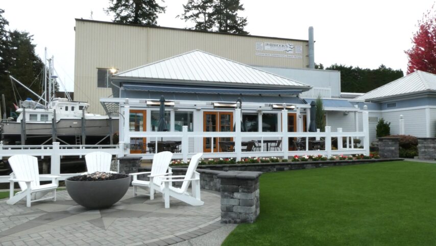 Sea & Glass Waterfront Grill restaurant with Philbrook's building in background