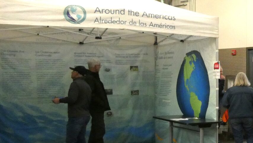 Photo of tent with text for education Around the Americas