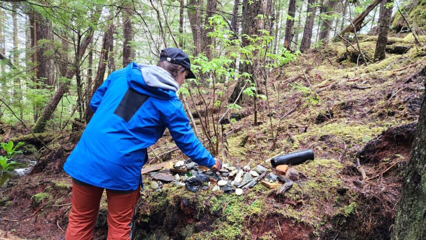 Inspecting a shell and rock collection at Meyers Chuck