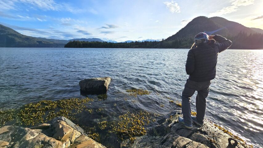 Flotilla participant taking photos at Port Neville