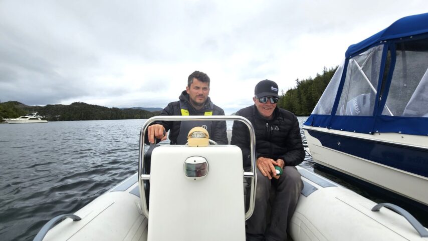 Flotilla leader picking up guests by dinghy to go ashore