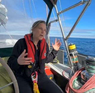 Jennifer Dalton dropping a SWIFT Buoy that measures wave height