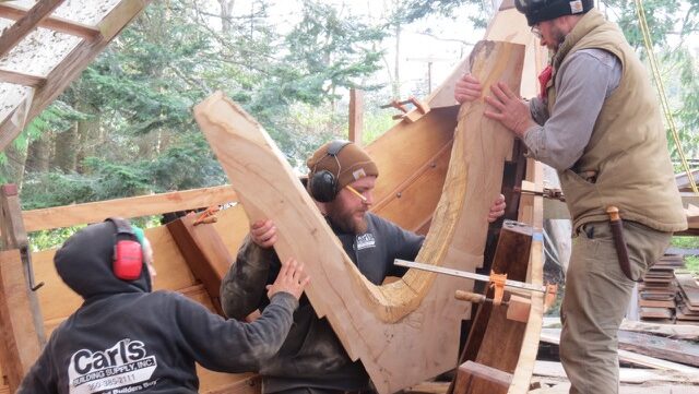 Photo of work crew building the Viking Ship Valkyrie
