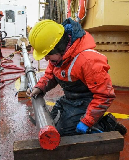 Crew member with tube for core sampling