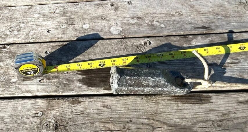 Photo of lead line with tape measure showing the measured shallow depth.