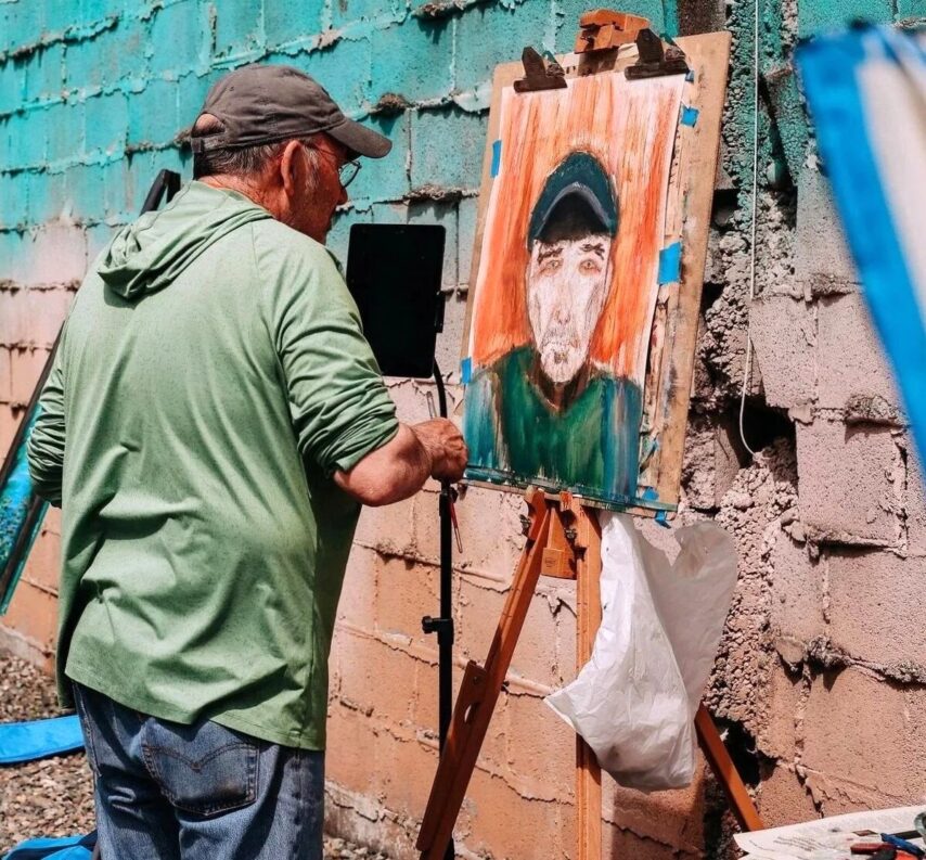 Artist painting at Artisans' Alley in Port Orchard